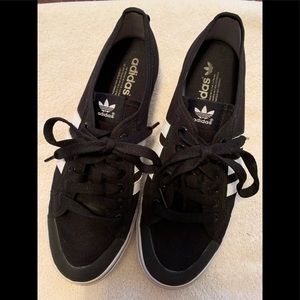 Mens 10 1/2 Adidas black and white shoes